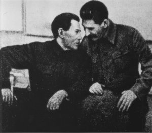 Nikolai Yezhov conferring with Stalin