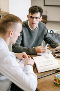 Two men studying together